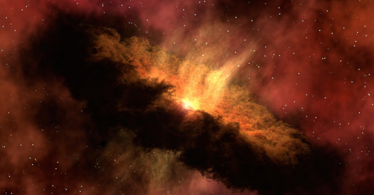 Dramatic image of a cosmic dust cloud with vivid colors and starry sky.